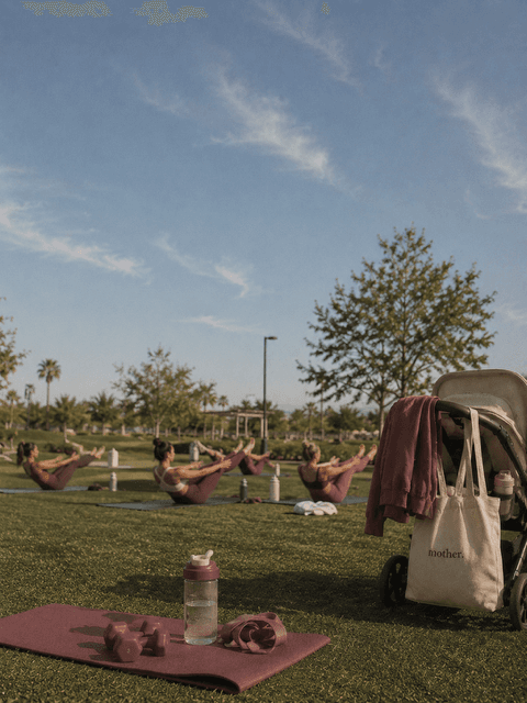 motherhouse community Pilates class outdoors with stroller