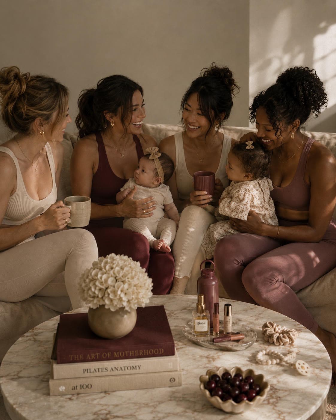 motherhouse community gathering — mothers with babies on a couch
